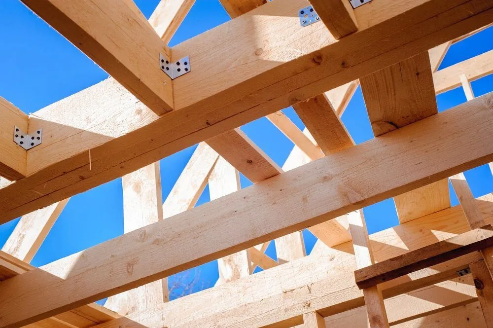 Looking Up at the Ceiling of a Wooden Structure Under Construction — Ozi Construction Pty Ltd in Balmain, NSW
