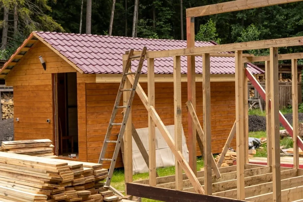 A Wooden House is Being Built in the Woods — Ozi Construction Pty Ltd in Balmain, NSW